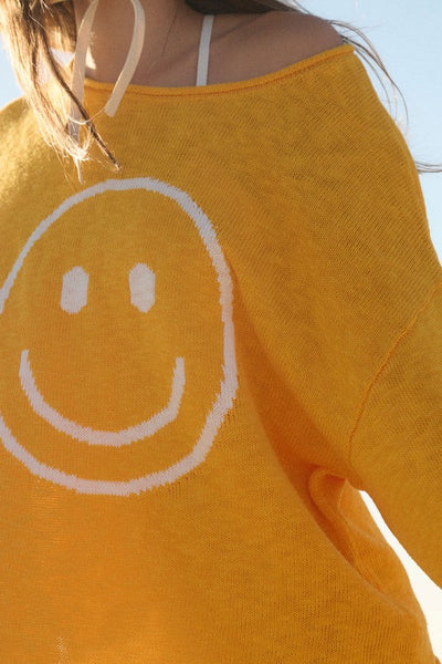 Smiley face sweater