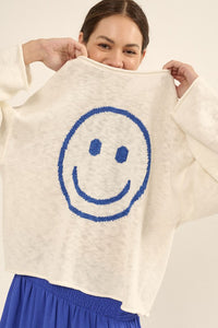 Smiley face sweater